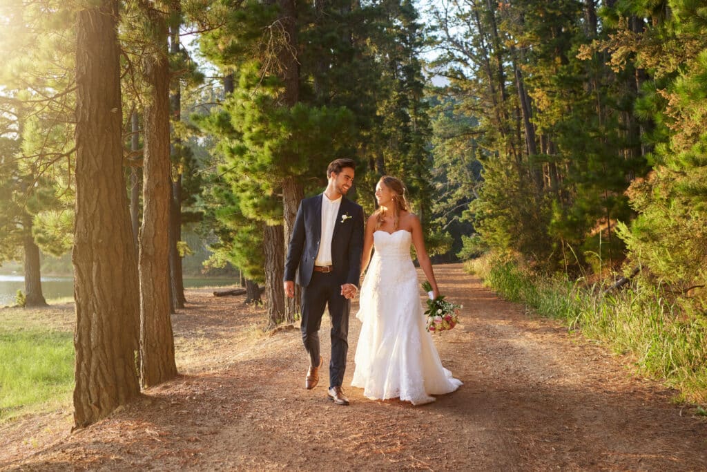Outbound Mammoth - Weddings - Bride and Groom Walking Down Dirt Path