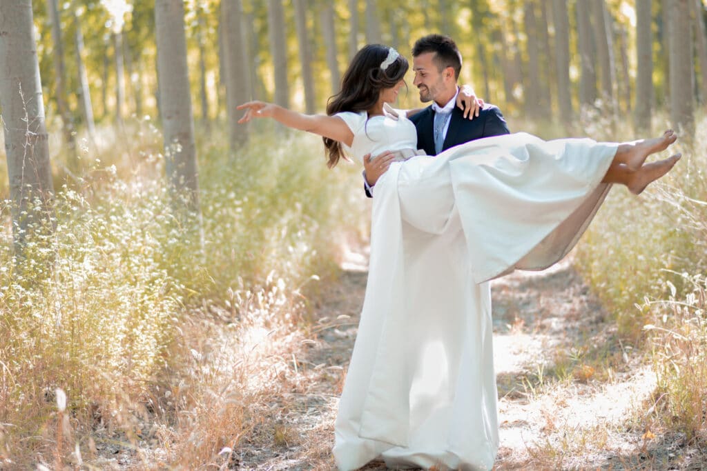 Outbound Mammoth - Weddings - Bride and Groom Lifting Bride