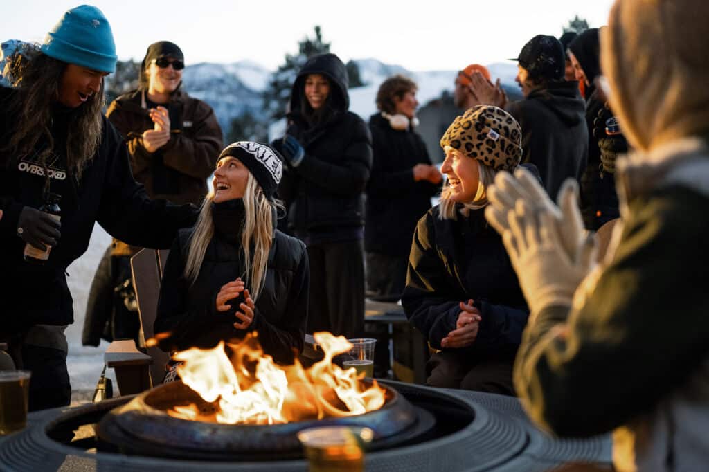People around a fire at Outbound Mammoth