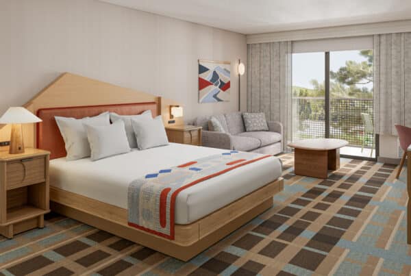 King bed and seating area in a Park City hotel room