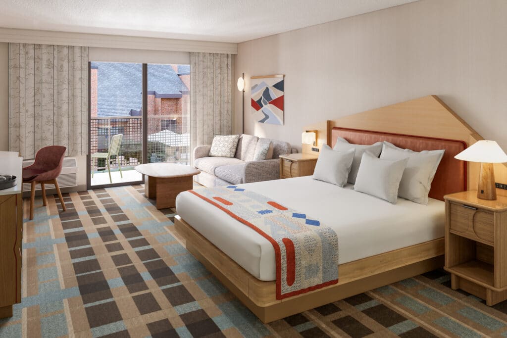 Outbound-Hotels-Park-City-Rooms-King Balcony seating outside an Outbound Park City guestroom