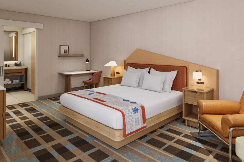 Outbound-Hotels-Park-City-Rooms-King-Suite-2 Outbound King Suite with bed and seating area