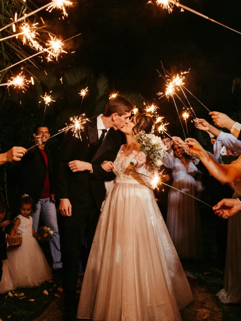 Outbound Mammoth - Weddings - Bride and Groom Kissing Under Sparklers