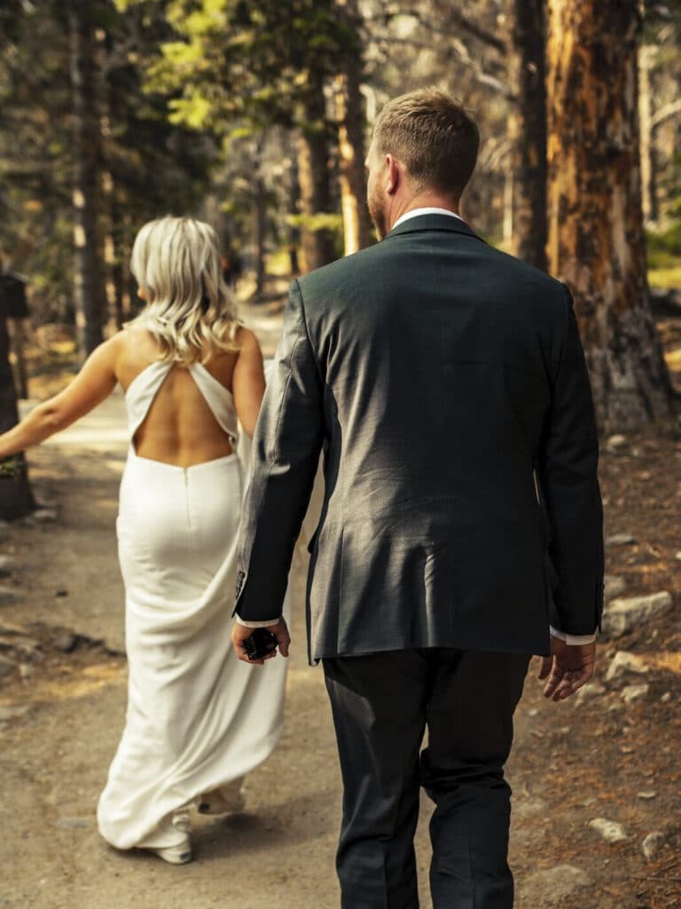 Outbound Stowe - Wedding Bridge and Groom Walking Through the Forrest
