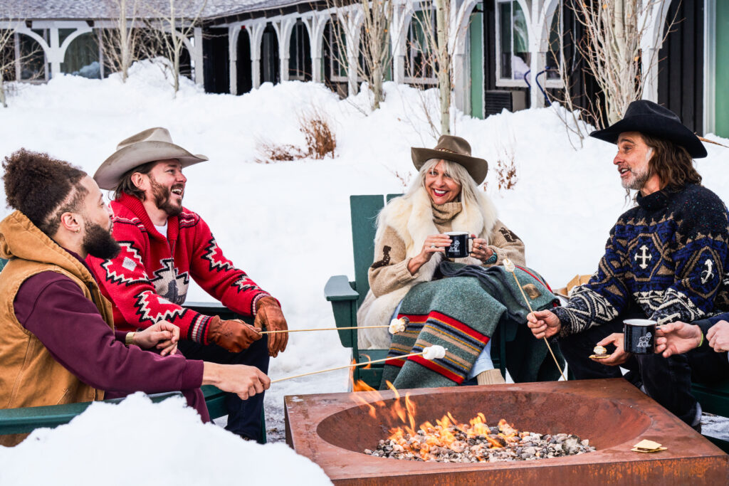 Virg Firepit Friends by Knoxy Knox-05392 Friends sitting around a fireplace enjoying some fun conversation