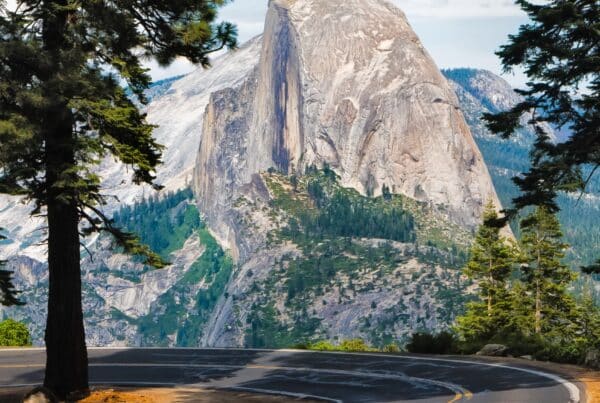 Yosemite road with snow capped mountain