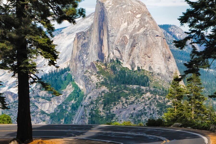 Yosemite road with snow capped mountain