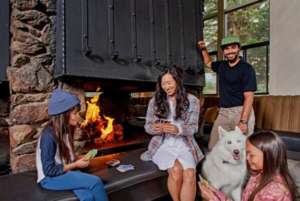 Playing cards by the fireplace